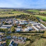 Aerial landscape view of Mill Road Industrial Estate in Linlithgow, West Lothian, Scotland, with surrounding countryside and residential areas.