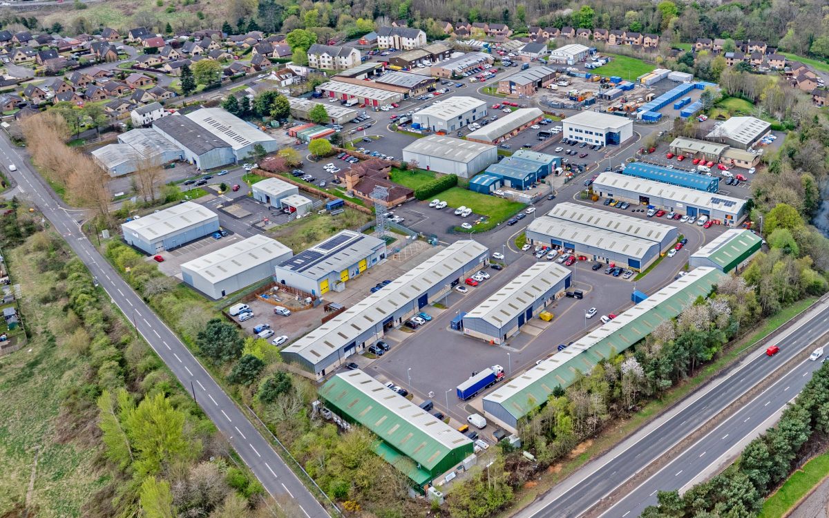 Aerial view of Mill Road Industrial Estate in Linlithgow, showing a variety of commercial units and tenant activity.