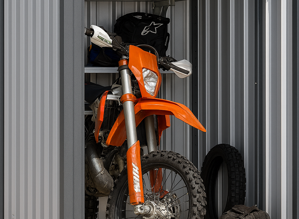 Motorbike securely stored inside a Boxxs Mini Boxx self-storage unit with drive-up access