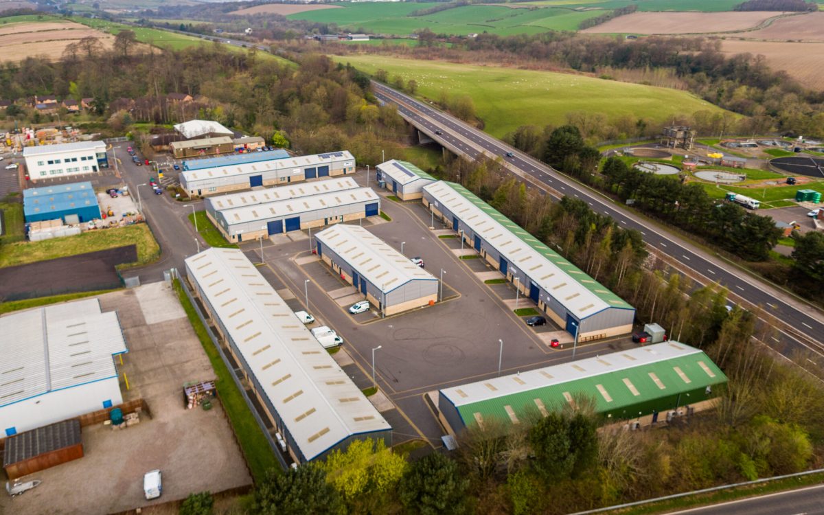 Aerial view of E-Net Park in Linlithgow, part of Mill Road Industrial Estate, showing modern light industrial units with excellent road access