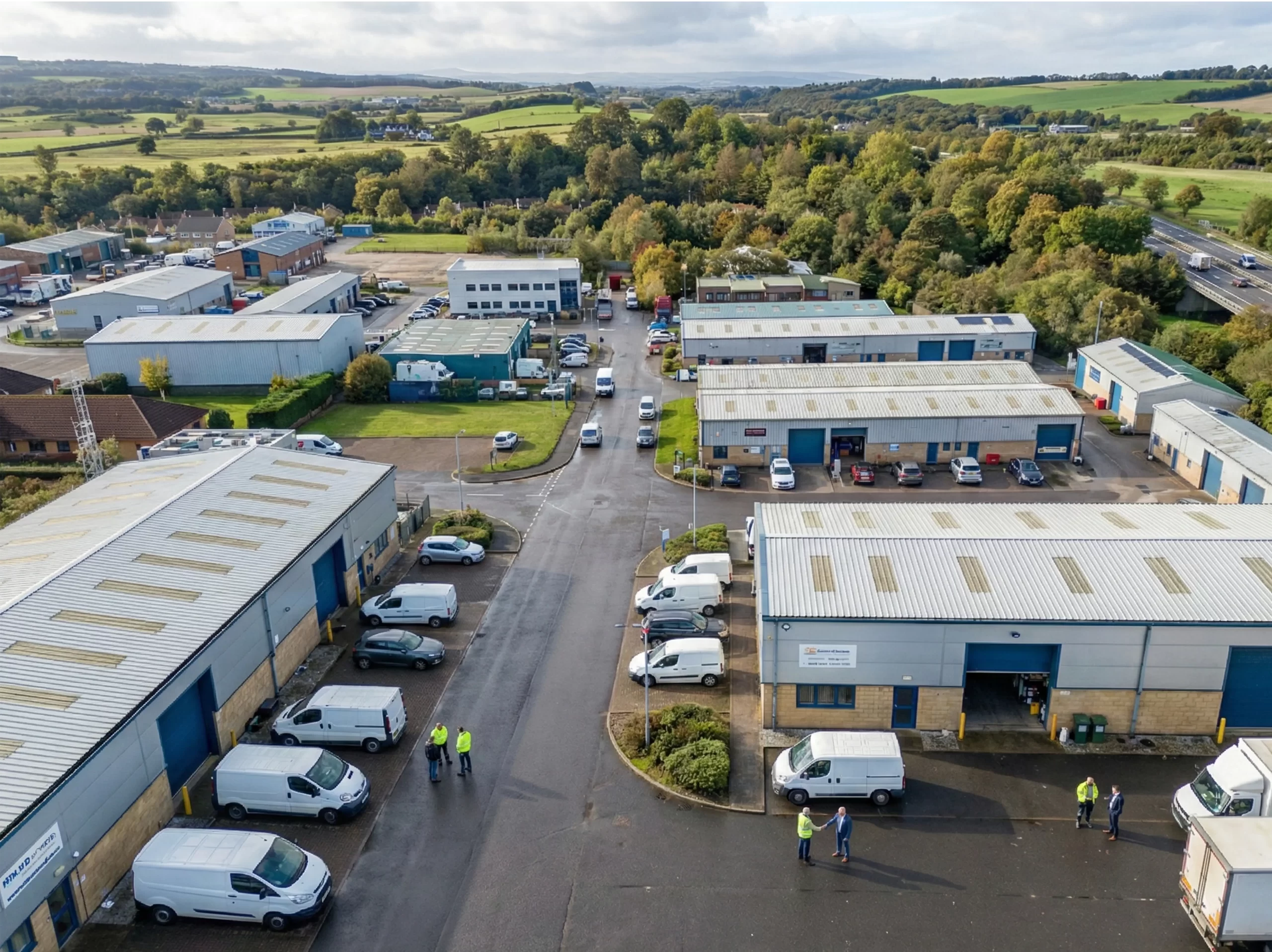 Mill Road Industrial Estate in Linlithgow showing industrial units with vehicle access near motorway routes