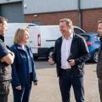 First time commercial tenants speaking with property managers at Mill Road Industrial Estate in Linlithgow